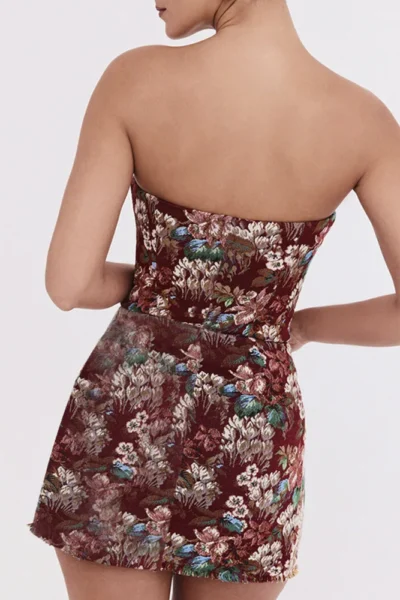 Back view of off-shoulder backless print mini dress