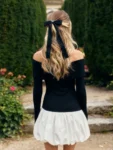Black and white off-shoulder patchwork mini dress.webp