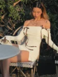 Front view of ivory bodycon dress.webp