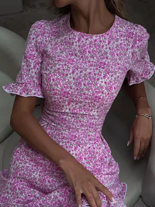 Pink floral ruffle sleeve mini dress with romantic silhouette and soft stretch