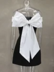 White and black mini dress front view.webp