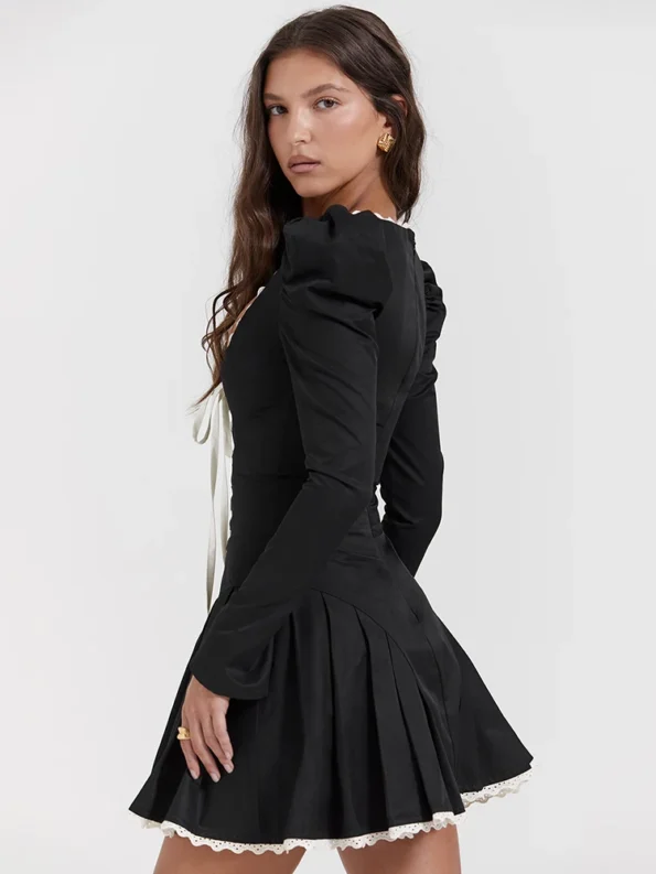 Studio flat lay of lace bandage mini dress