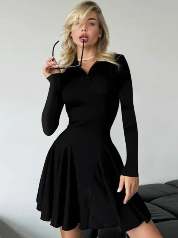 Long sleeve pleated knit mini dress in black
