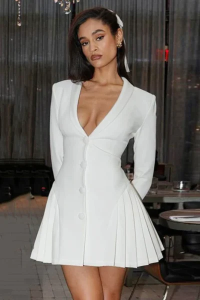 Deep v-neck mini dress with long sleeves and ruffle hem