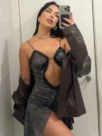 Black mini dress selfie front.webp