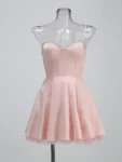 Black spaghetti strap mini dress with tulle skirt.webp