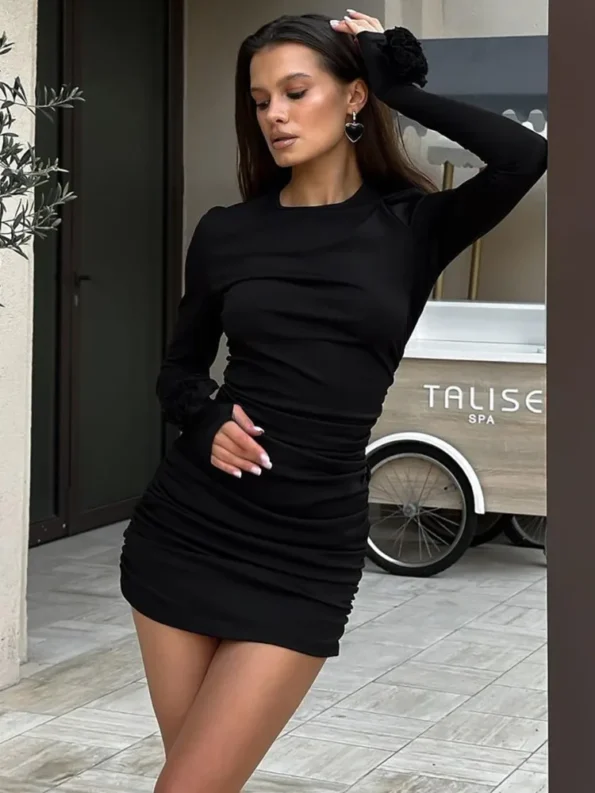 Black floral cuff long sleeve mini dress with ruched fit