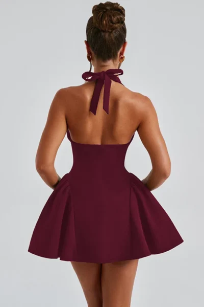 elegant burgundy halter mini dress with open back and flared skirt