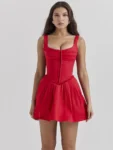 Woman wearing red sleeveless square neck corset mini dress