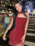 Polka dot scarf collar mini dress front view.webp