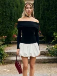 Black and white off-shoulder patchwork mini dress.webp