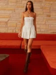 Strapless backless white a-line mini dress on model