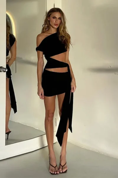 Hollow out oblique shoulder black mini dress walking pose