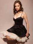 Black spaghetti strap mini dress with tulle skirt.webp