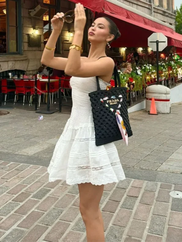 elegant off-shoulder strapless mini dress white sitting pose