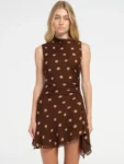 woman wearing sleeveless polka dot mini dress for women