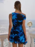 Front view of blue print ruffled mini dress.webp