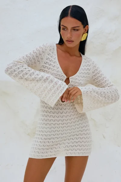 Close-up hollow out knit and neckline detail