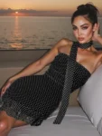 Polka dot scarf collar mini dress front view.webp