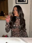Leopard print turtleneck mini dress front.webp