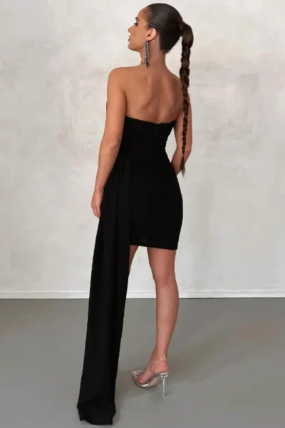 Back view black strapless ruched mini dress
