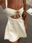 Hollow out bandage backless mini dress on display