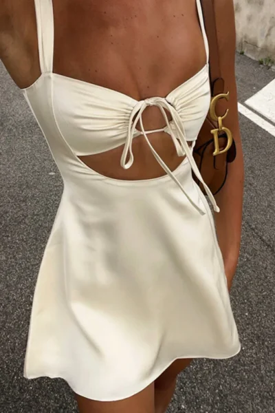 Hollow out bandage backless mini dress on display
