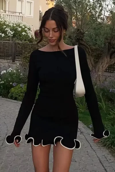 Long sleeve knit mini dress with ruffled hem front view