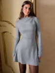 Woman wearing gray long sleeve high waist bodycon mini dress